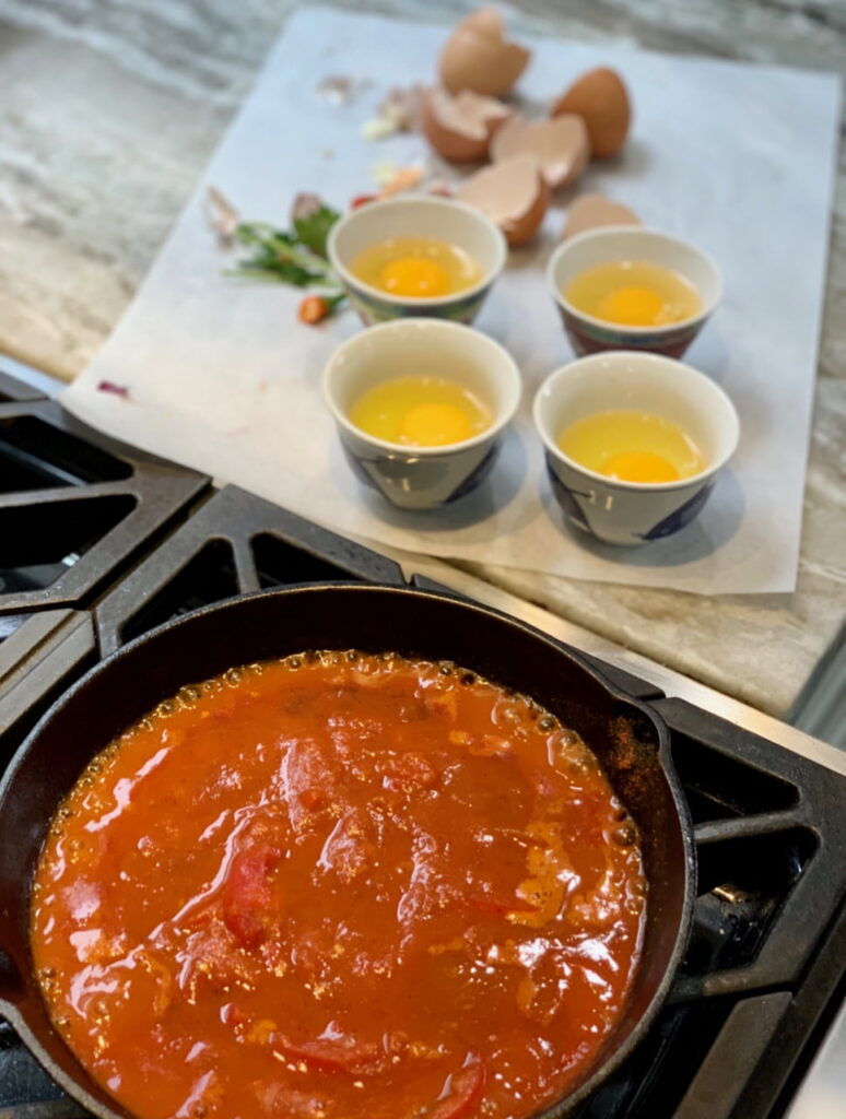 Eggs prepped for easy Shakshuka cooking.