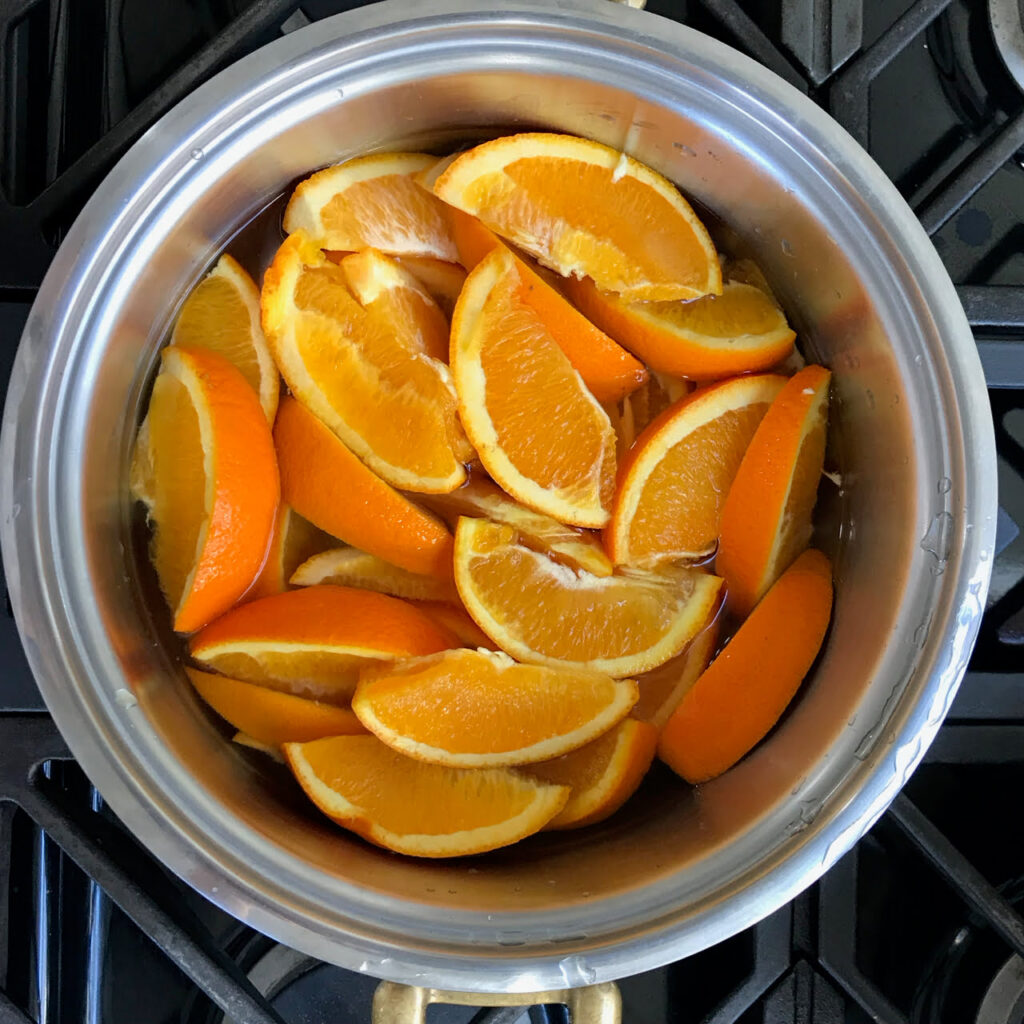 Whole oranges prepared for the best orange cake.
