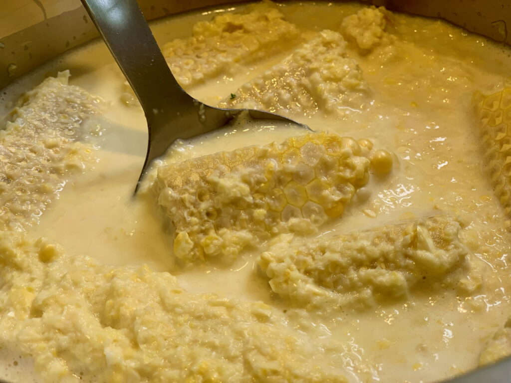 Simmering Corn On The Husk To Extract Its Essence