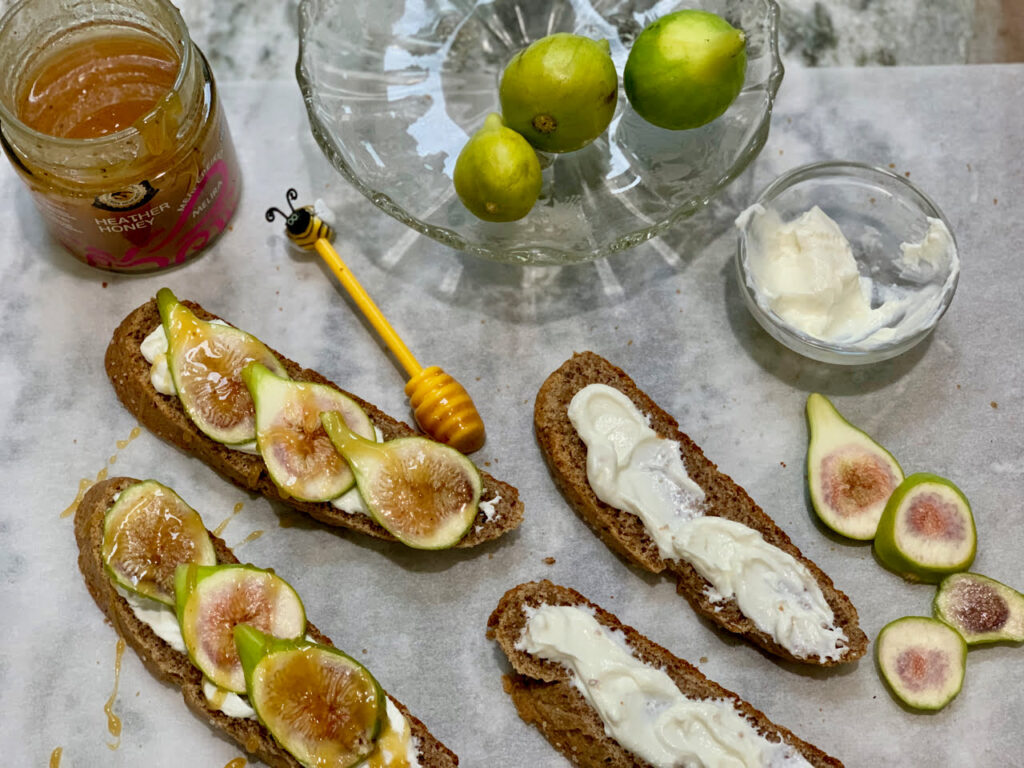 Assemble figs, yogurt and honey on top of the pecan yeast bread