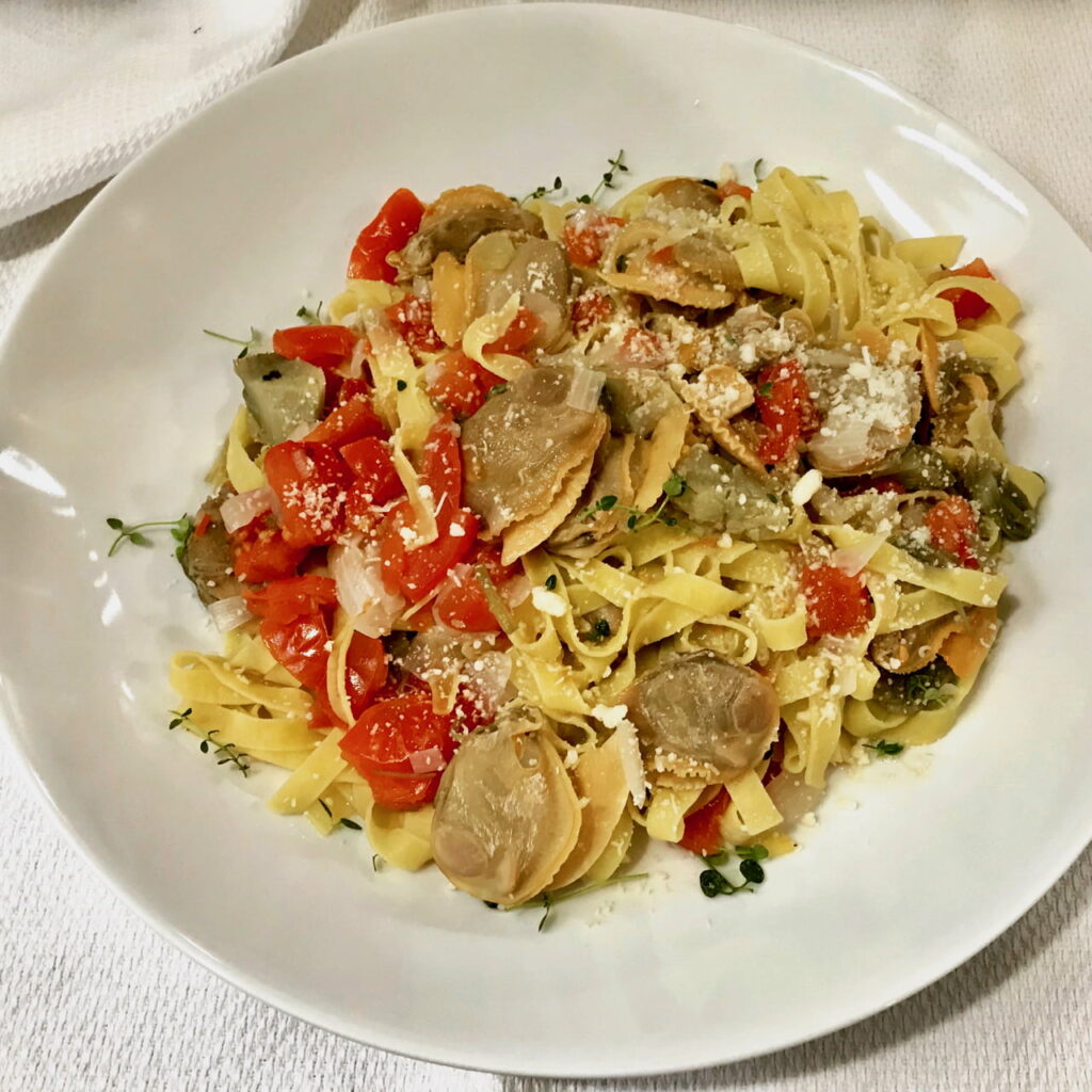clams and garden tomatoes over pasta