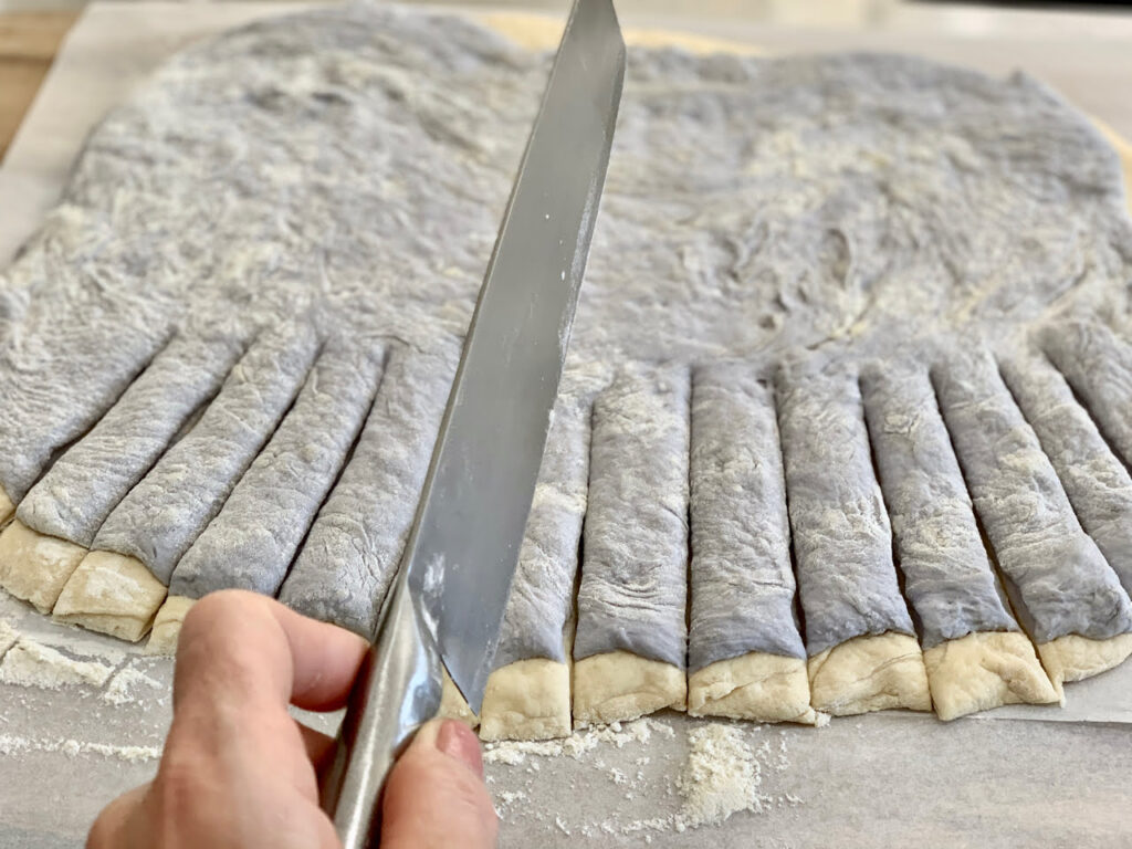 Fray edges on one side of dough before rolling for a lovely appearance after baked