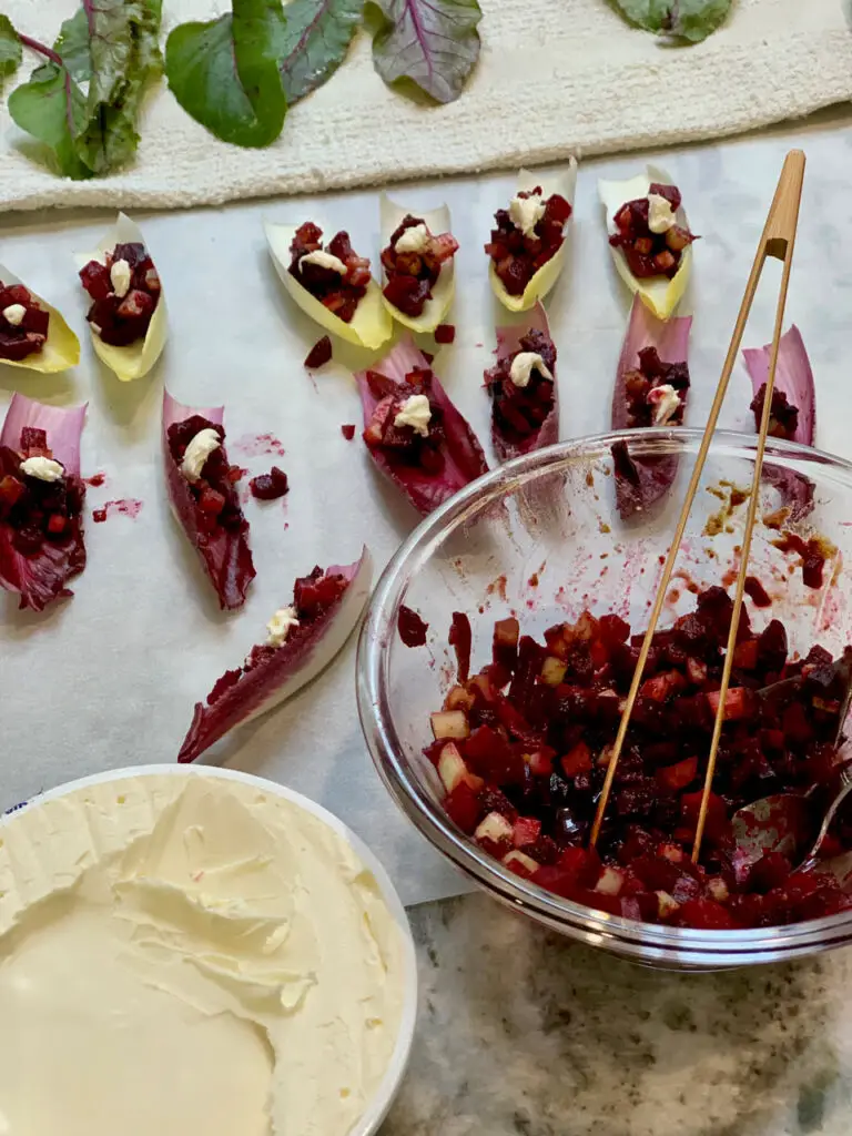 The Roasted Beet and Savory Fig Dressing Is Served In Endive Leaves