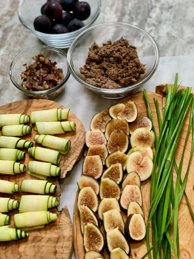 zucchini rolls, fresh figs and garlic chives