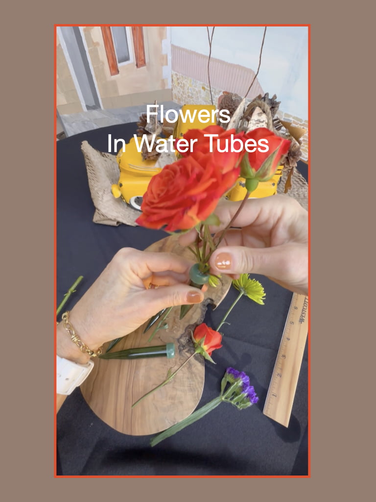 Flowers In Water Tubes