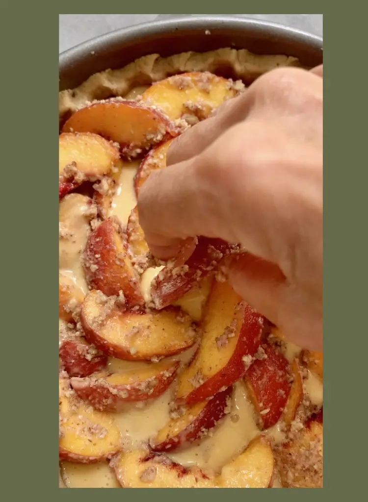 Lots Of Fresh Peaches Are Baked On Top Of The Peach Rum Custard Pie