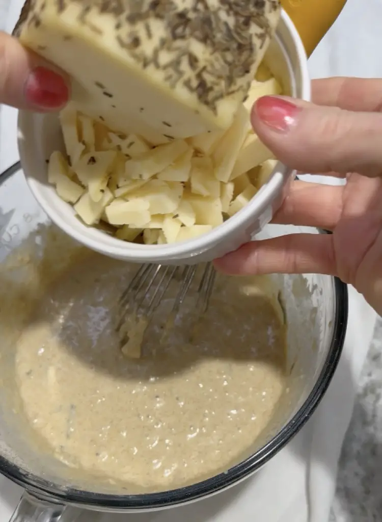 A Favorite Hard Cheese In The Batter Before Baking