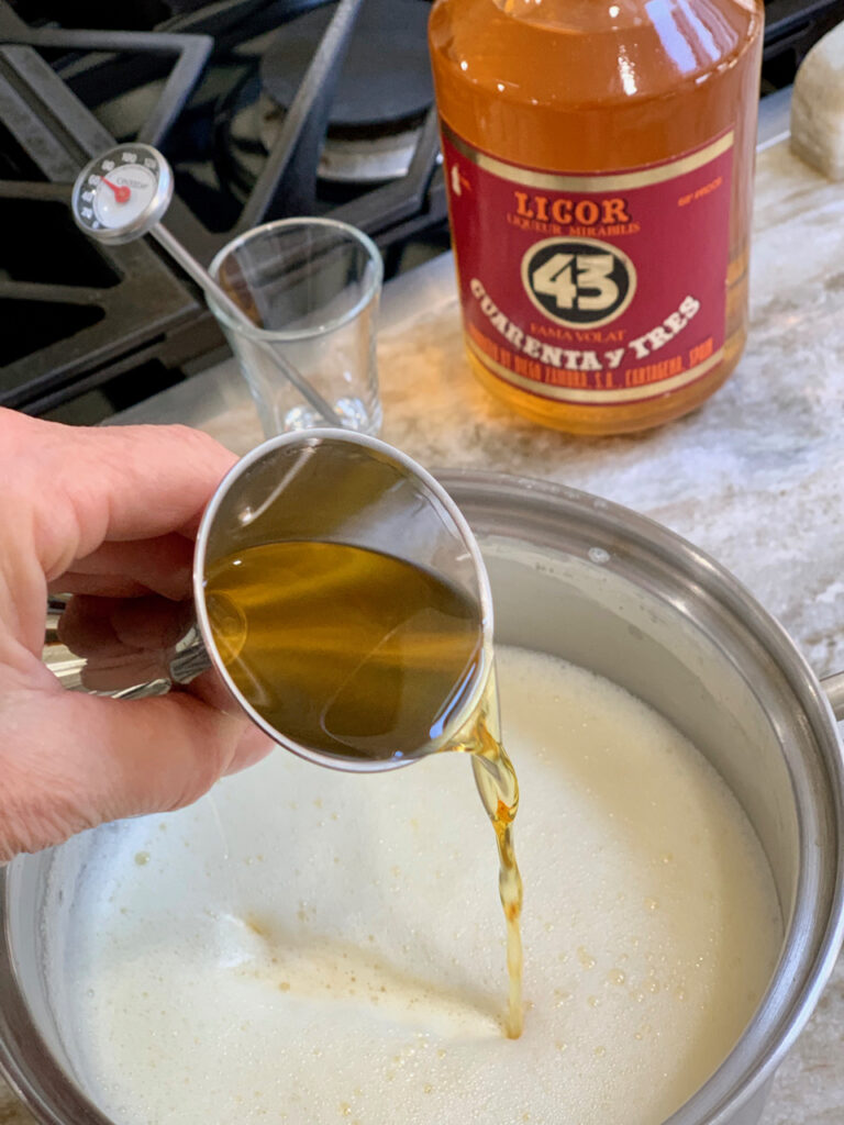 Adding Licor 43 To The Cooked Eggnog Mixture