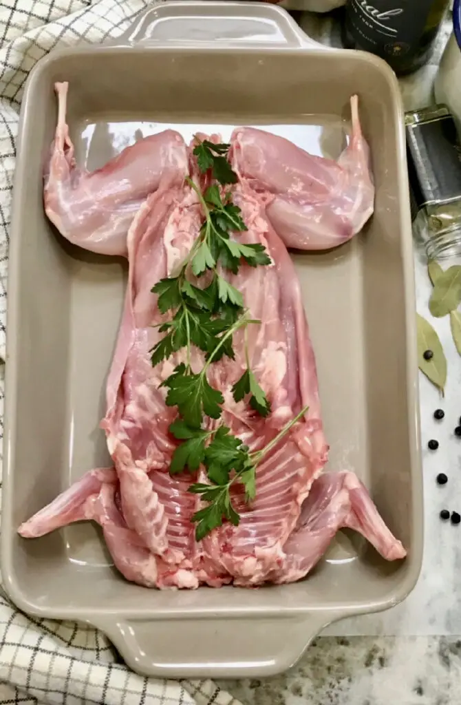 Whole Rabbit And Herbs To Be Roasted
