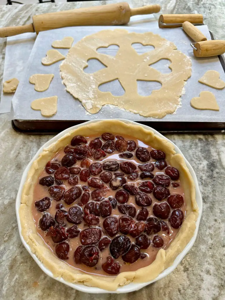 Cherry Filling Prepared And Placed Into The Crust Awaiting The Top
