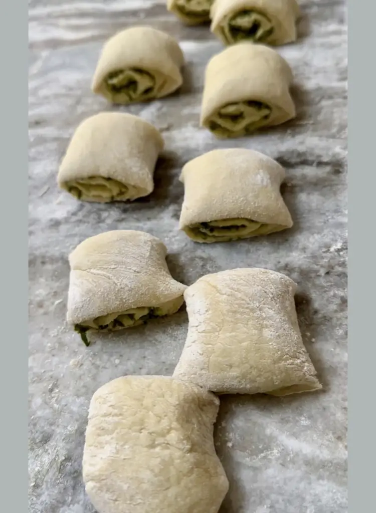 Basil Pesto Rolled Inside Bread Dough and Ready For Baking