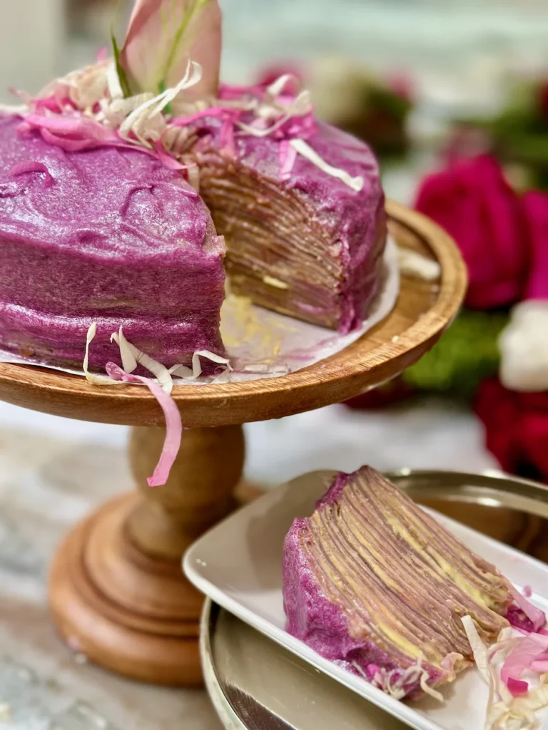 Purple Sweet Potato Crepe Cake with Passion Fruit Creme Filling and Purple Fairy Dust