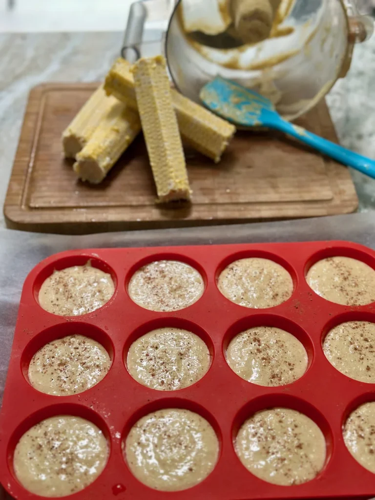 Polenta Muffin Batter Prepped In Silicone Muffin Pan And Ready To Bake