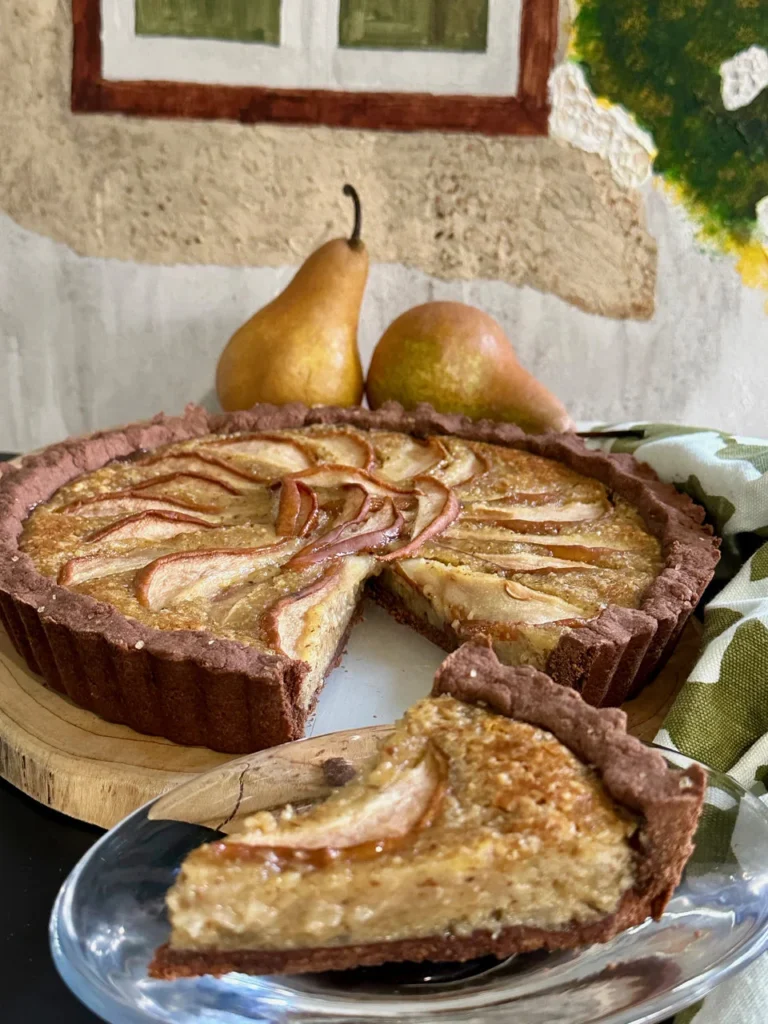 Hazelnut and Chocolate Crusted Pear Pie Topped With Pears & Baked With A Pear Custard Filling
