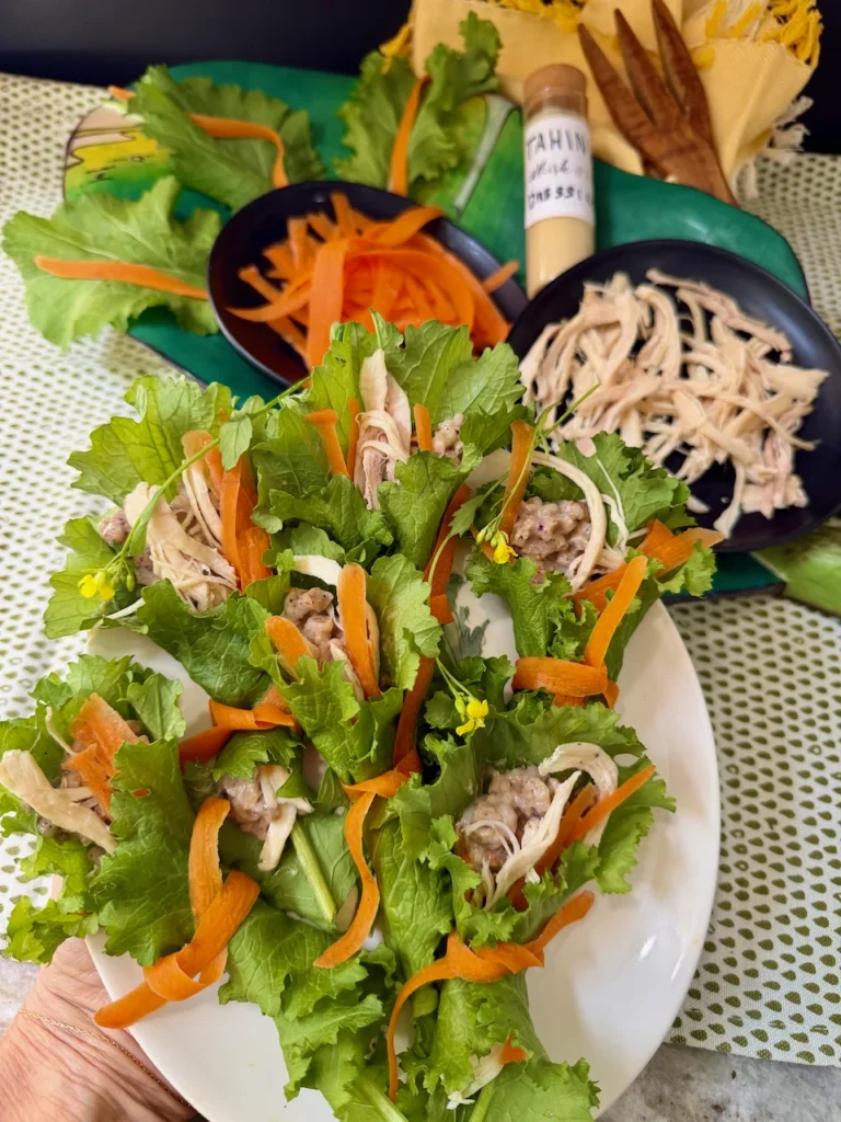 Mustard Green Wraps with Tahini Dressing and Tied with Carrot Strips
