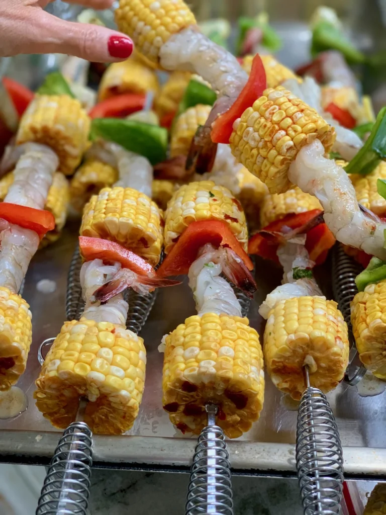 Nothing Says Summer Grilling Like Shrimp and Corn Basted with Mediterranean Dressing