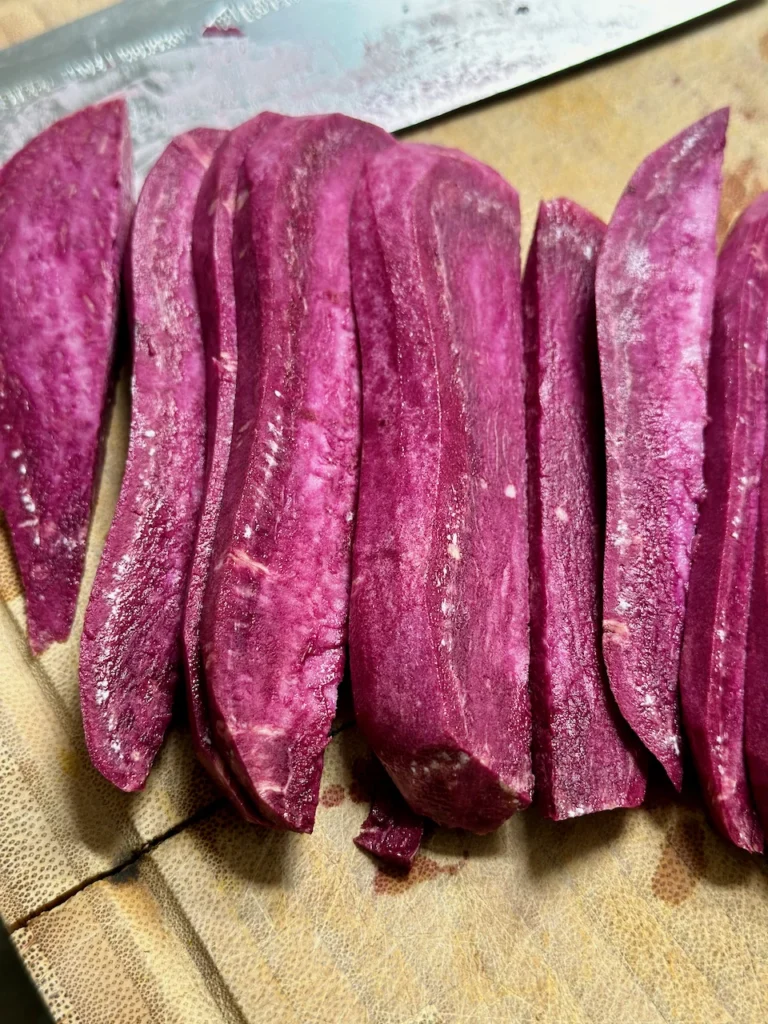 Peel and Slice Purple Sweet Potatoes to Cook and Puree for the Bread Dough