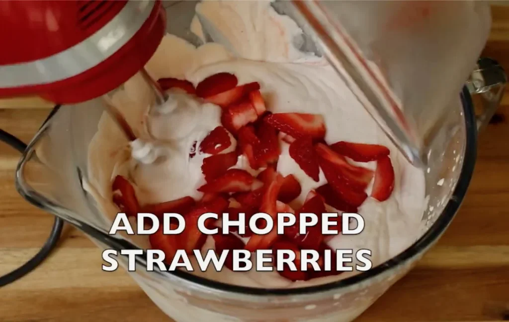 Strawberries Are Added To The Sweetened Pureed Rhubarb and Cream